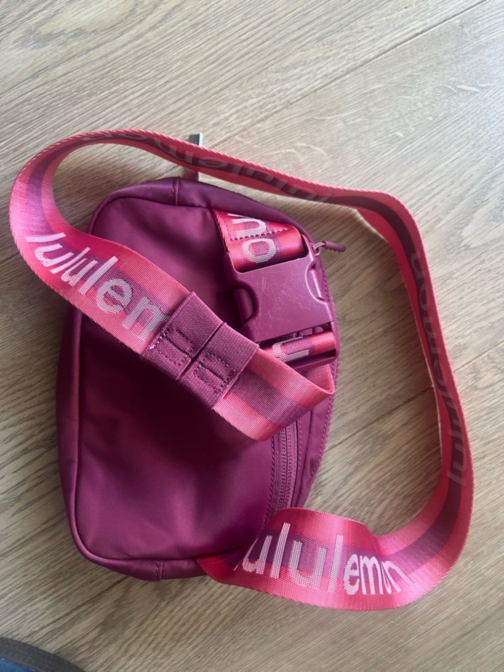 lululemon athletica Small Crossbody Pouch in Berry with Pink Strap